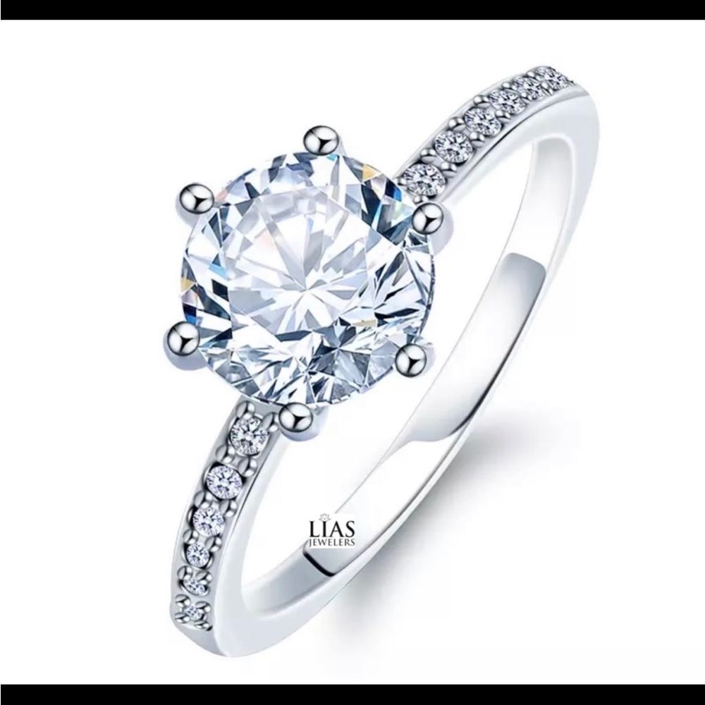 New 18k white gold engagement ring